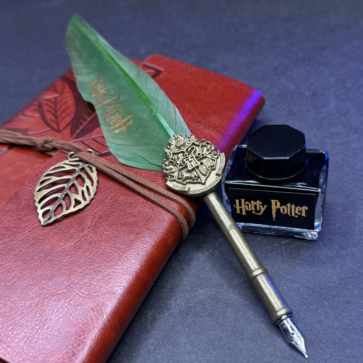 Harry Potter calligraphy set features a green feather quill pen